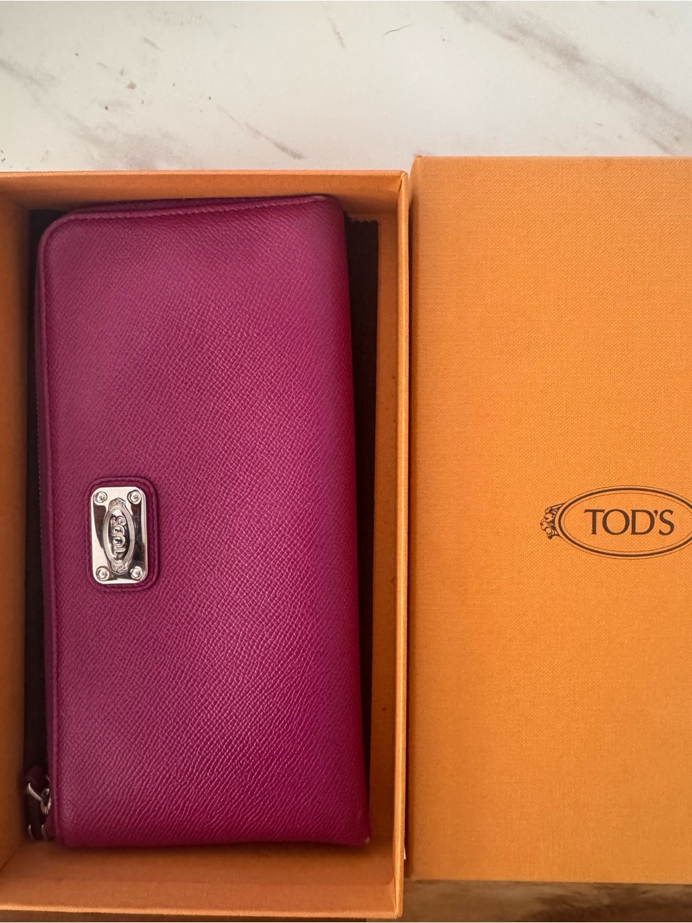 TOD'S Magenta Leather Zippy Wallet with Silver Hardware